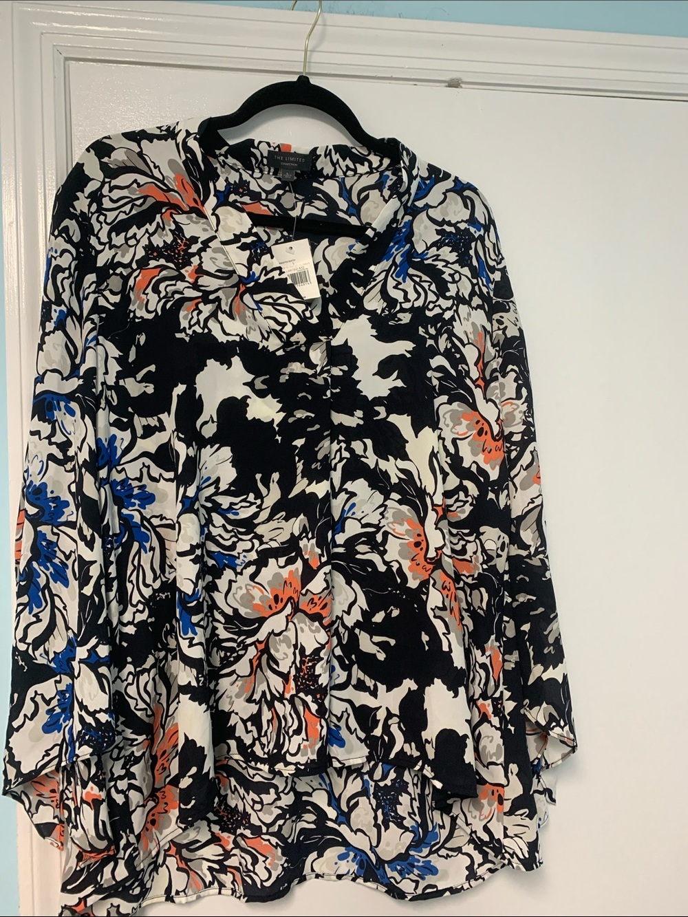 The Limited dark navy & White Floral V-Neck Blouse with Blue and Coral Accents